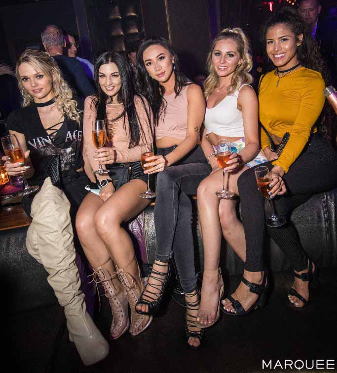 Ladies At A Marquee Promoter Table