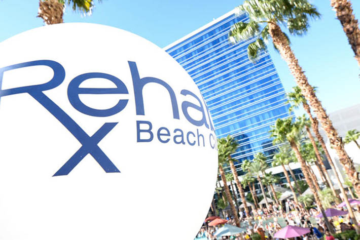 A large beach ball with the club in the background.