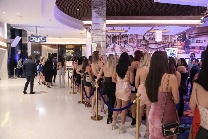 Ladies line up to get inside the club. 