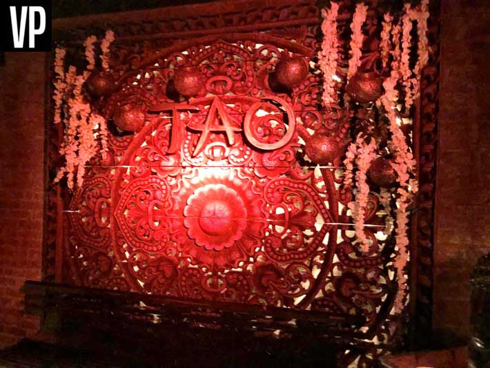 Before heading to your bottle service table, take a photo in front of the TAO sign