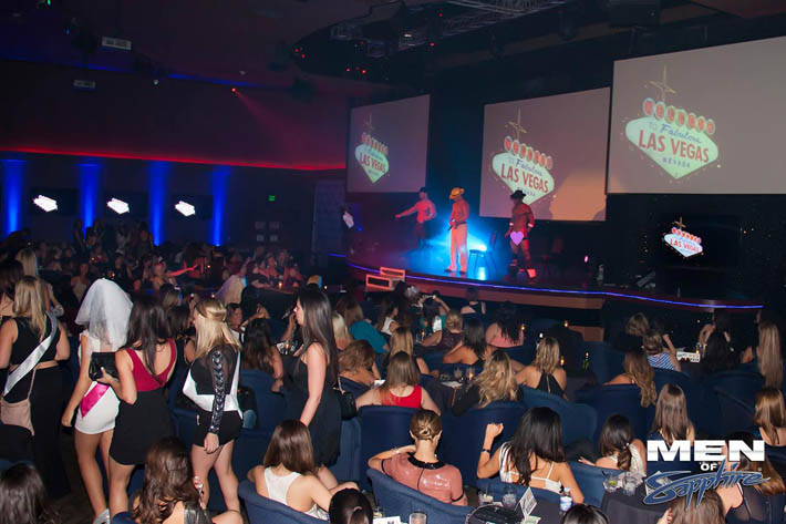 Guys dancing on stage at the Las Vegas male revue show