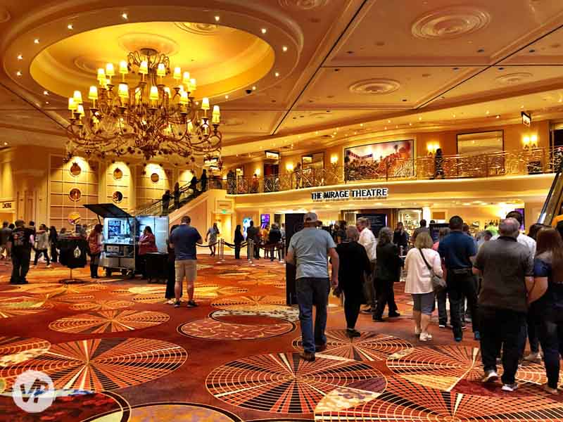 A photo of the escalators and concession stand at the theater