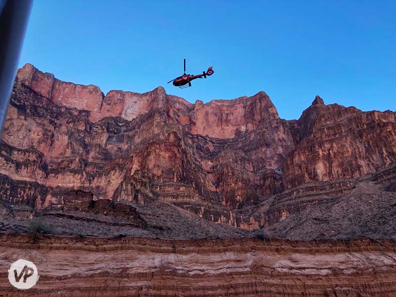 A helicopter flies back to the Air Ops building at Grand Canyon West