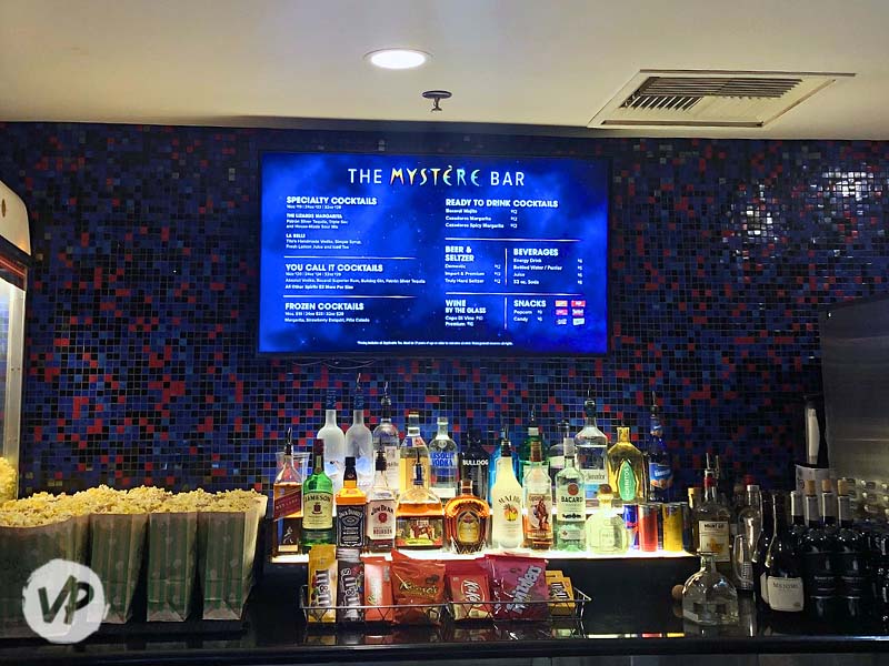A picture of the bar menu featuring specialty beverages