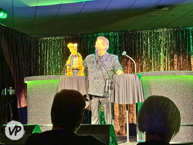 Terry Fator and Winston the turtle perform on stage in Vegas