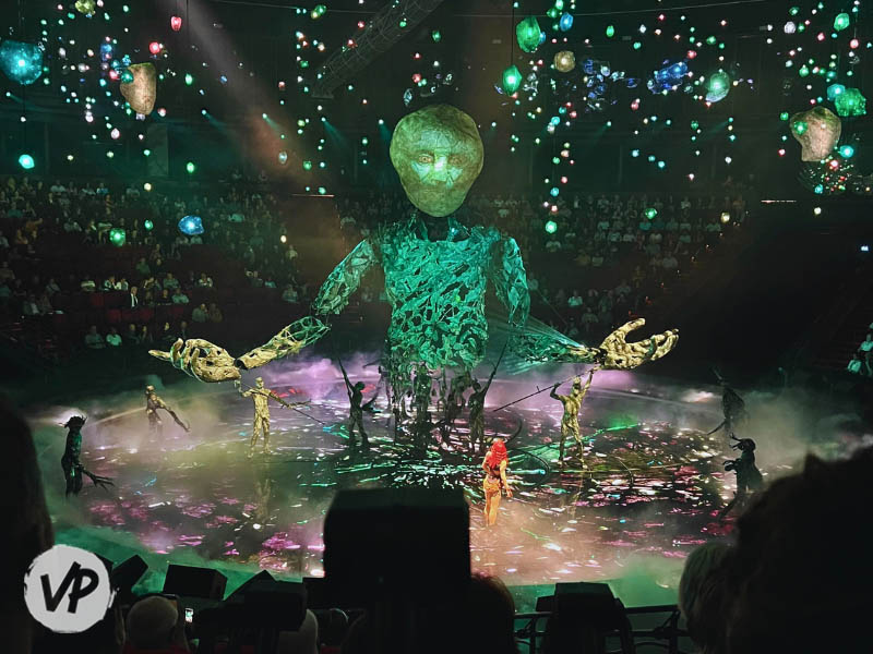 A large puppet of Light appears on stage at Awakening