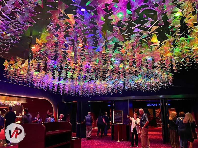 Colorful glass hanging from the ceiling at the entrance to the show