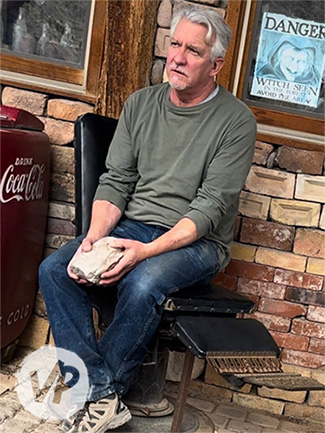 Our tour guide, Bruce, holding a quartz rock